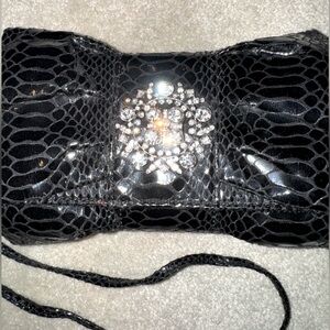 Vintage Iman black bow cross body clutch purse